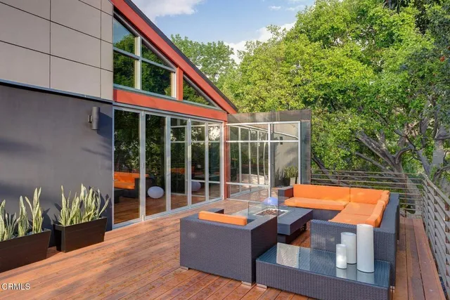 a backyard of a house with seating space