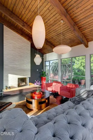 a outdoor space with patio the couches and pool table with chairs