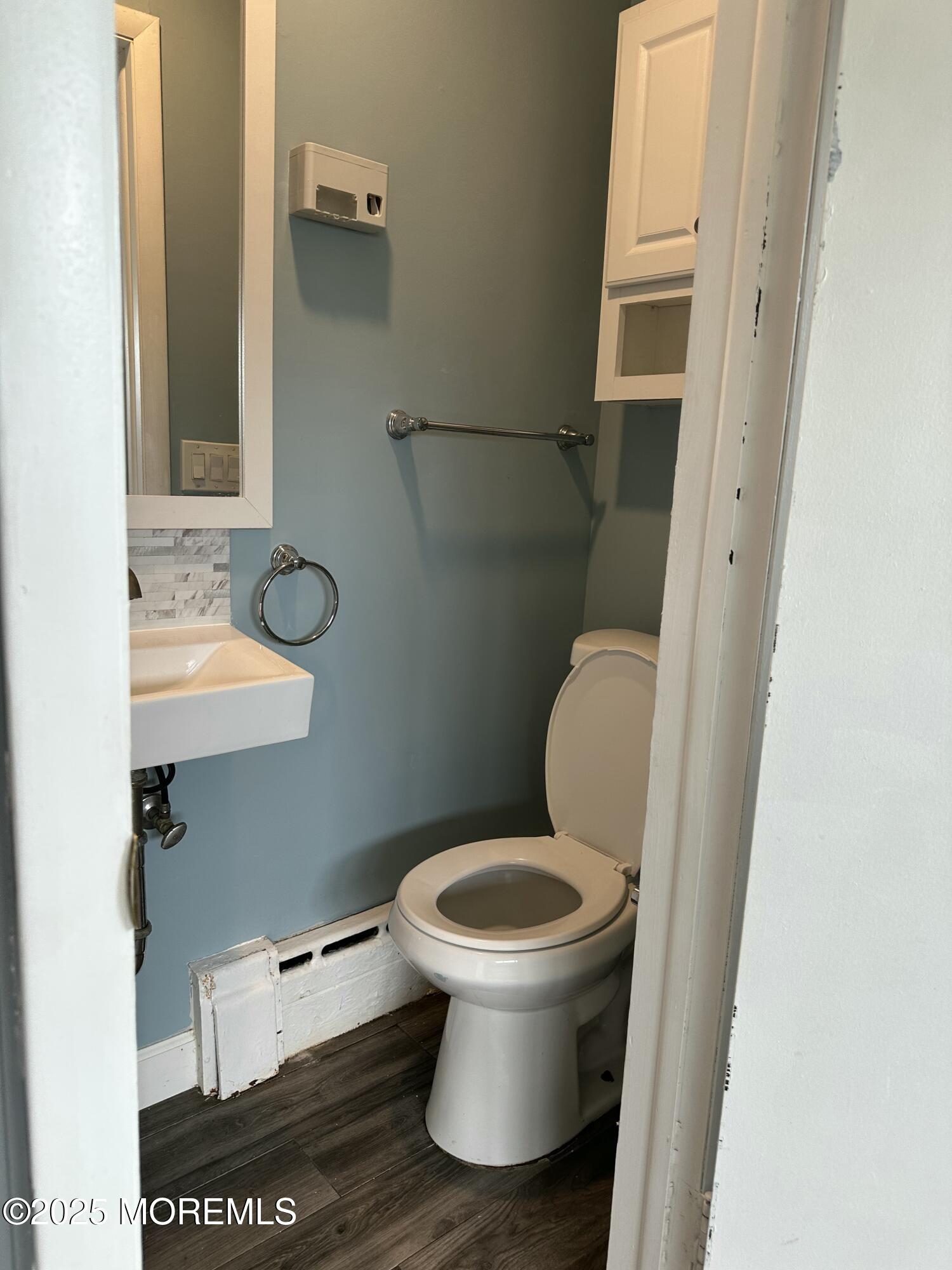 308 Myrtle Street Cliffwood, NJ 07721 - Photo 11 of 44 a bathroom with a toilet and a sink