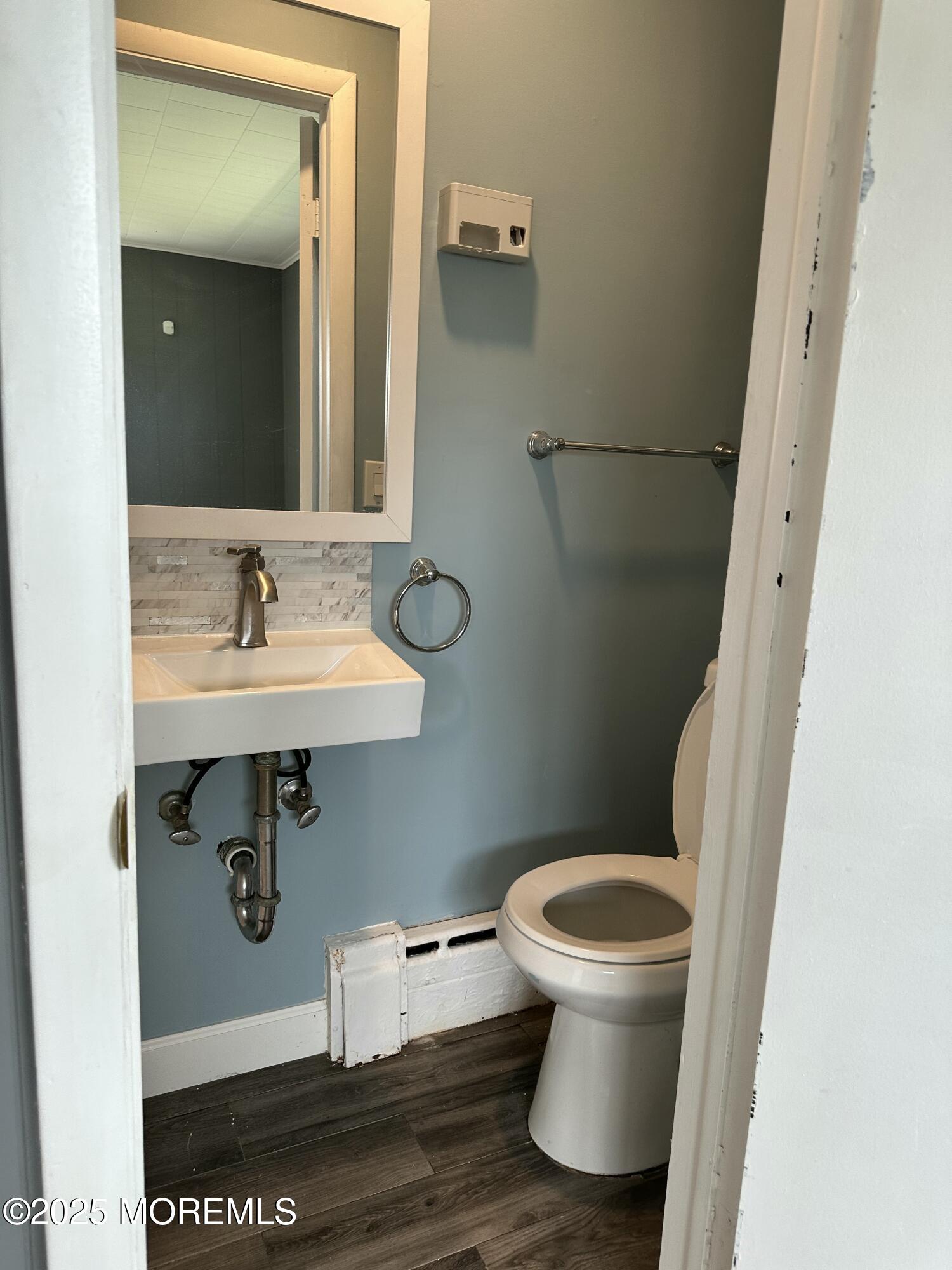 308 Myrtle Street Cliffwood, NJ 07721 - Photo 12 of 44 a bathroom with a toilet and a sink
