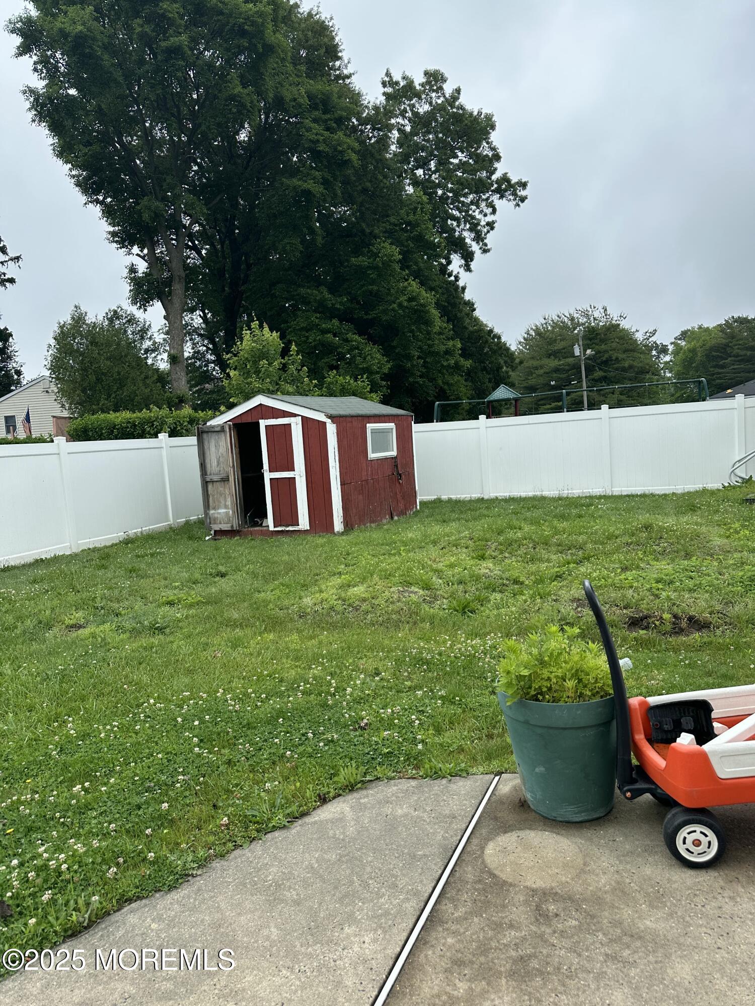 308 Myrtle Street Cliffwood, NJ 07721 - Photo 14 of 44 a view of a back yard of the house