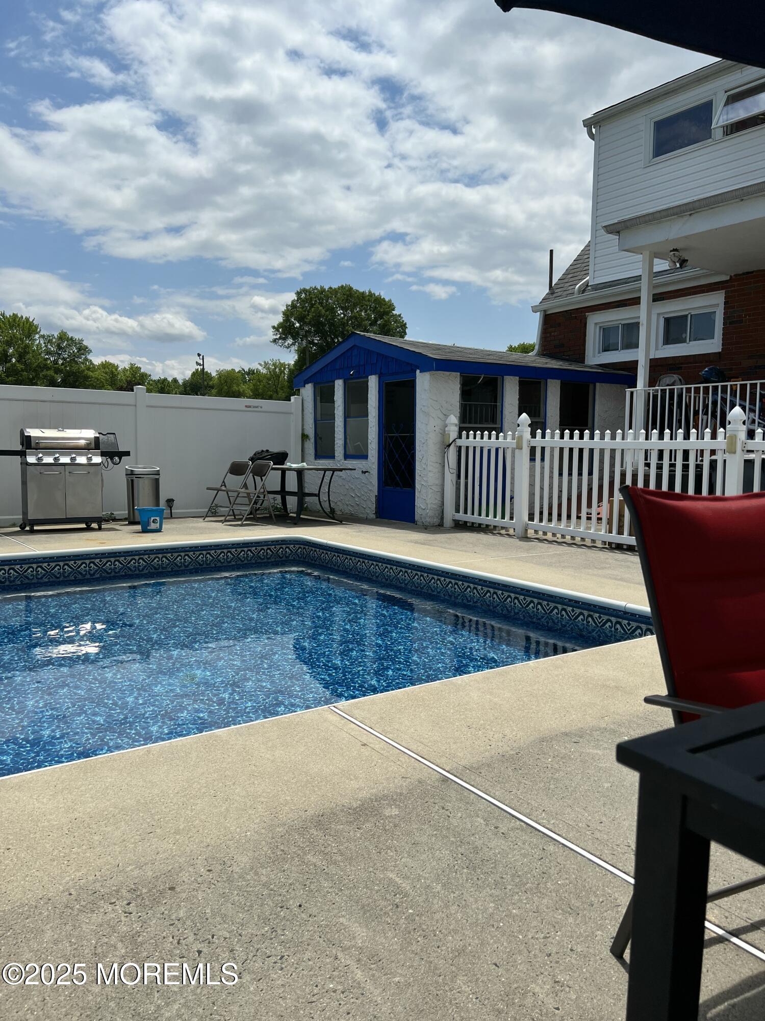 308 Myrtle Street Cliffwood, NJ 07721 - Photo 15 of 44 a view of a chairs and table on the terrace