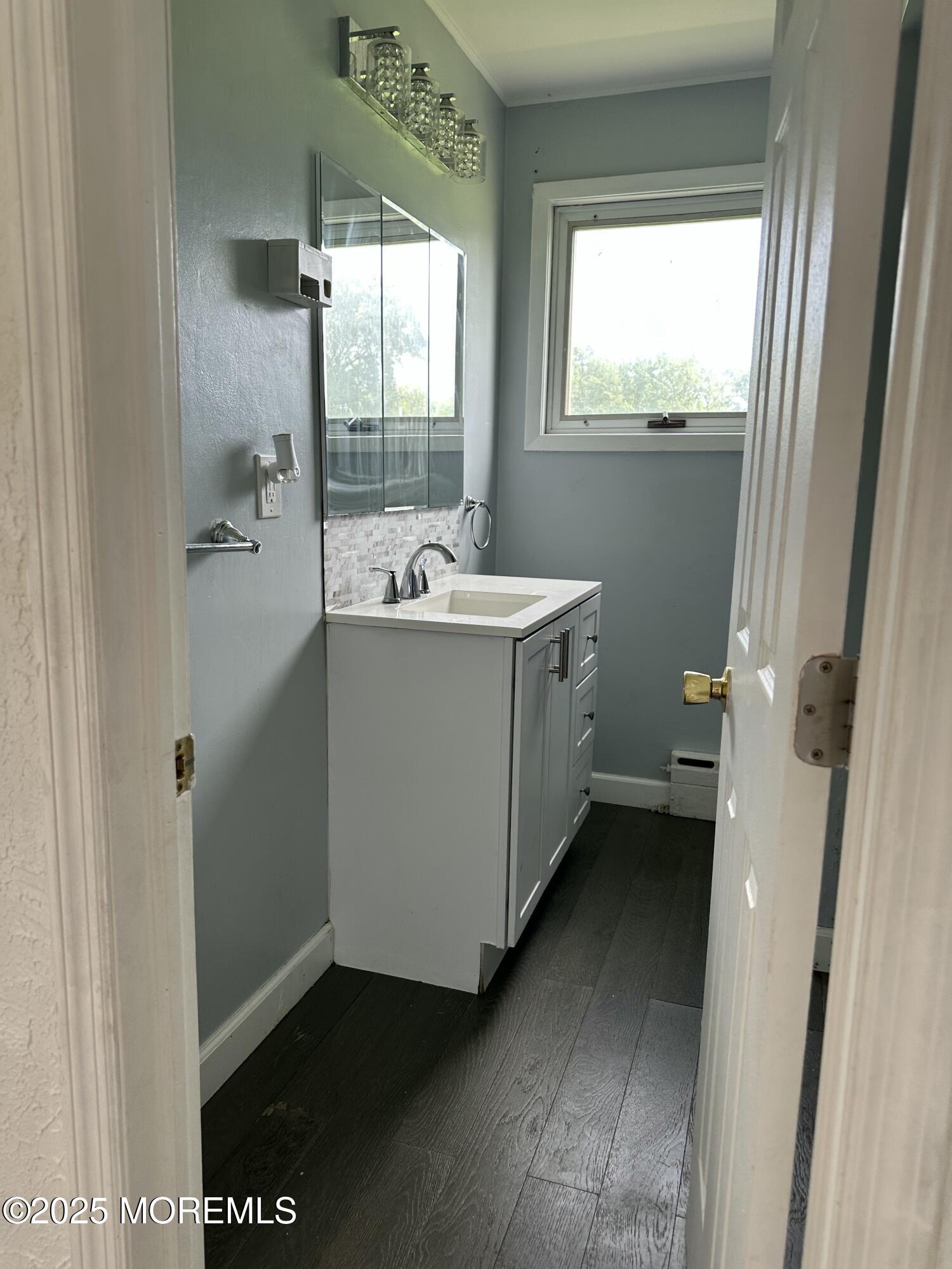 308 Myrtle Street Cliffwood, NJ 07721 - Photo 29 of 44 a view of a bathroom with a sink