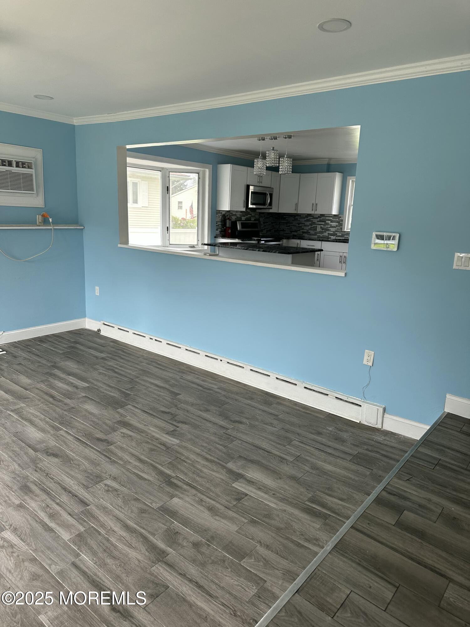 308 Myrtle Street Cliffwood, NJ 07721 - Photo 33 of 44 a view of a kitchen with microwave and floor to ceiling window