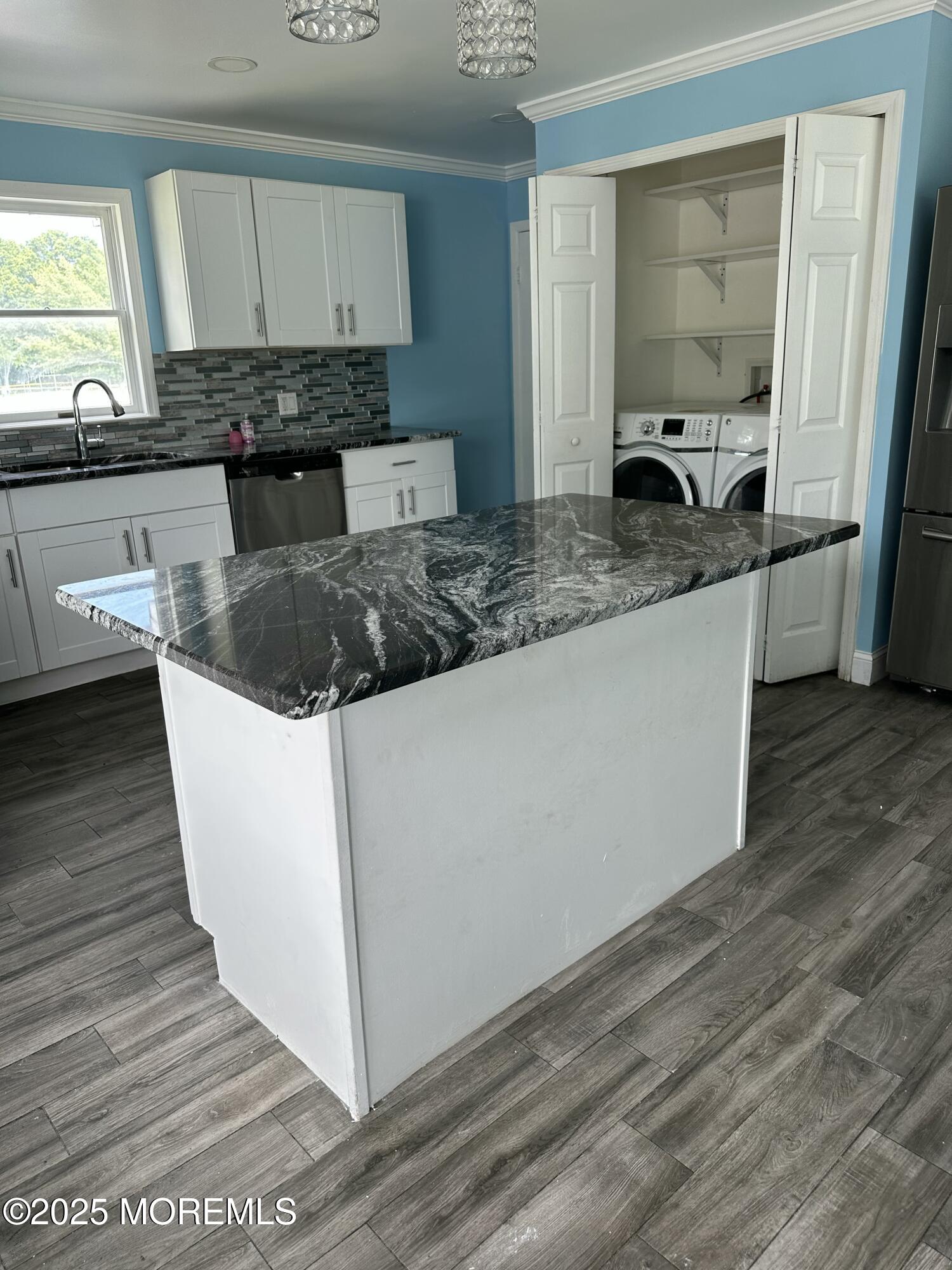 308 Myrtle Street Cliffwood, NJ 07721 - Photo 34 of 44 a kitchen with a stove a sink and a refrigerator