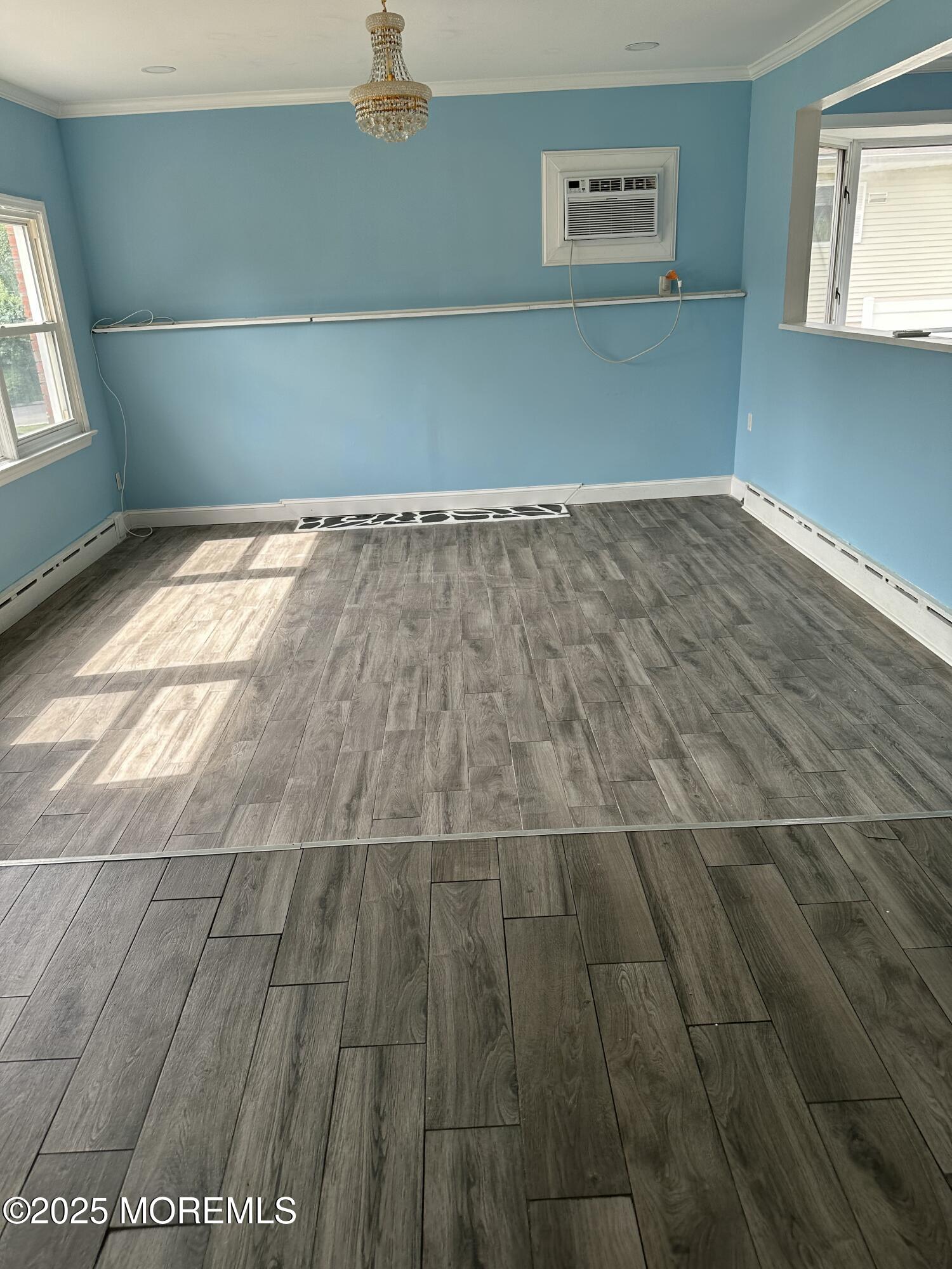 308 Myrtle Street Cliffwood, NJ 07721 - Photo 4 of 44 a view of a room with wooden floor and windows