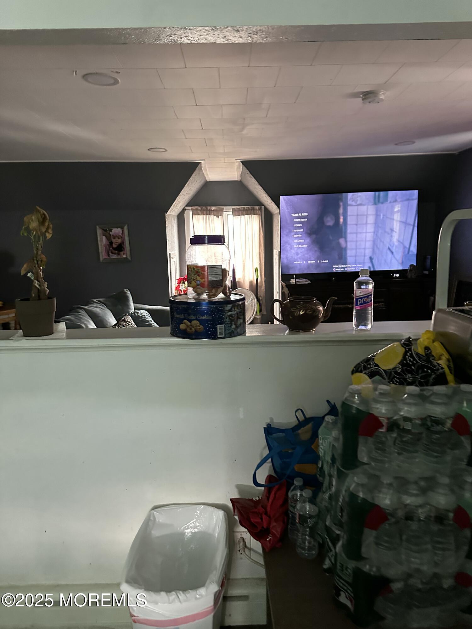 308 Myrtle Street Cliffwood, NJ 07721 - Photo 43 of 44 a kitchen with a sink a stove and cabinets