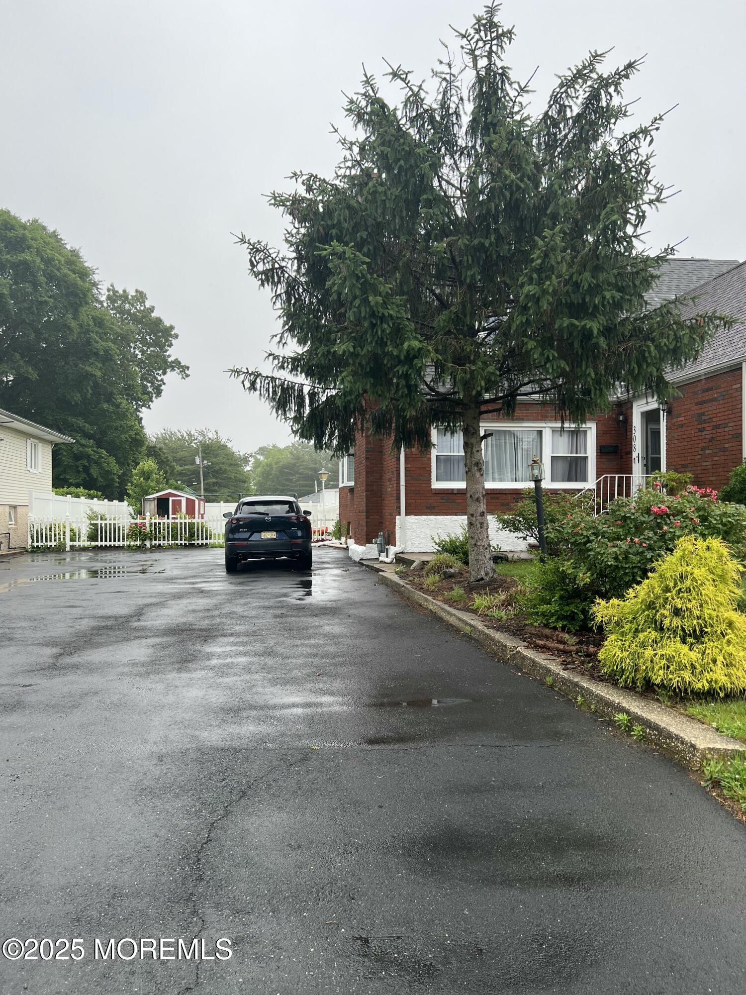 308 Myrtle Street Cliffwood, NJ 07721 - Photo 5 of 44 a car parked on the side of the road