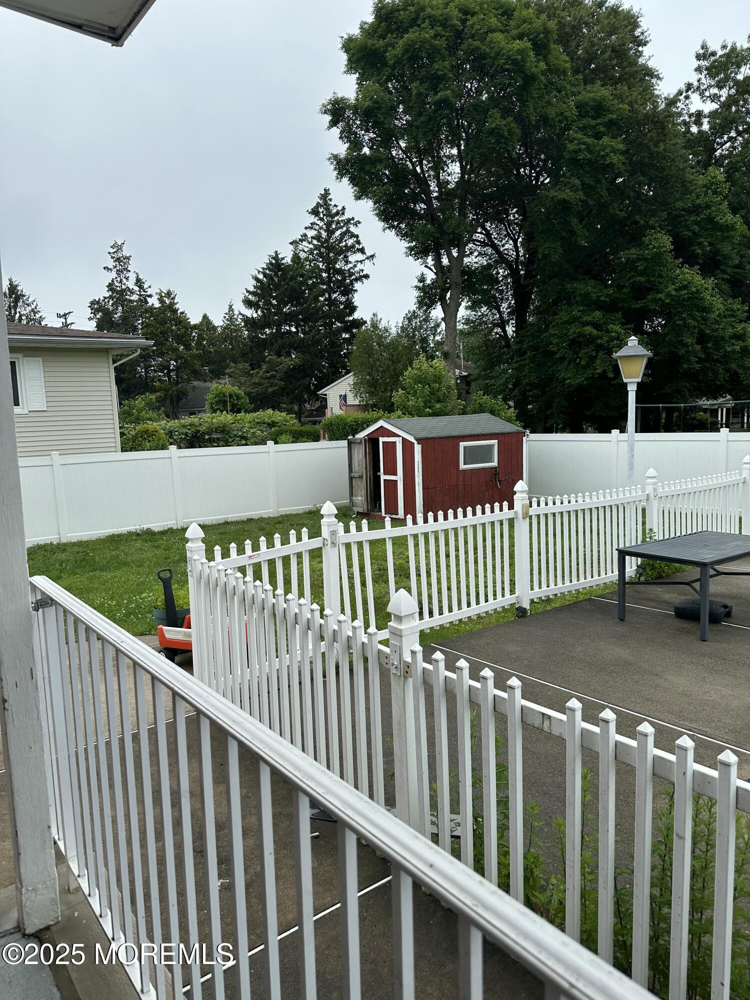 308 Myrtle Street Cliffwood, NJ 07721 - Photo 10 of 44 a view of a wooden deck and a yard