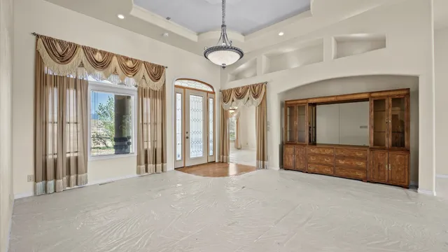 a view of a hallway with an entryway