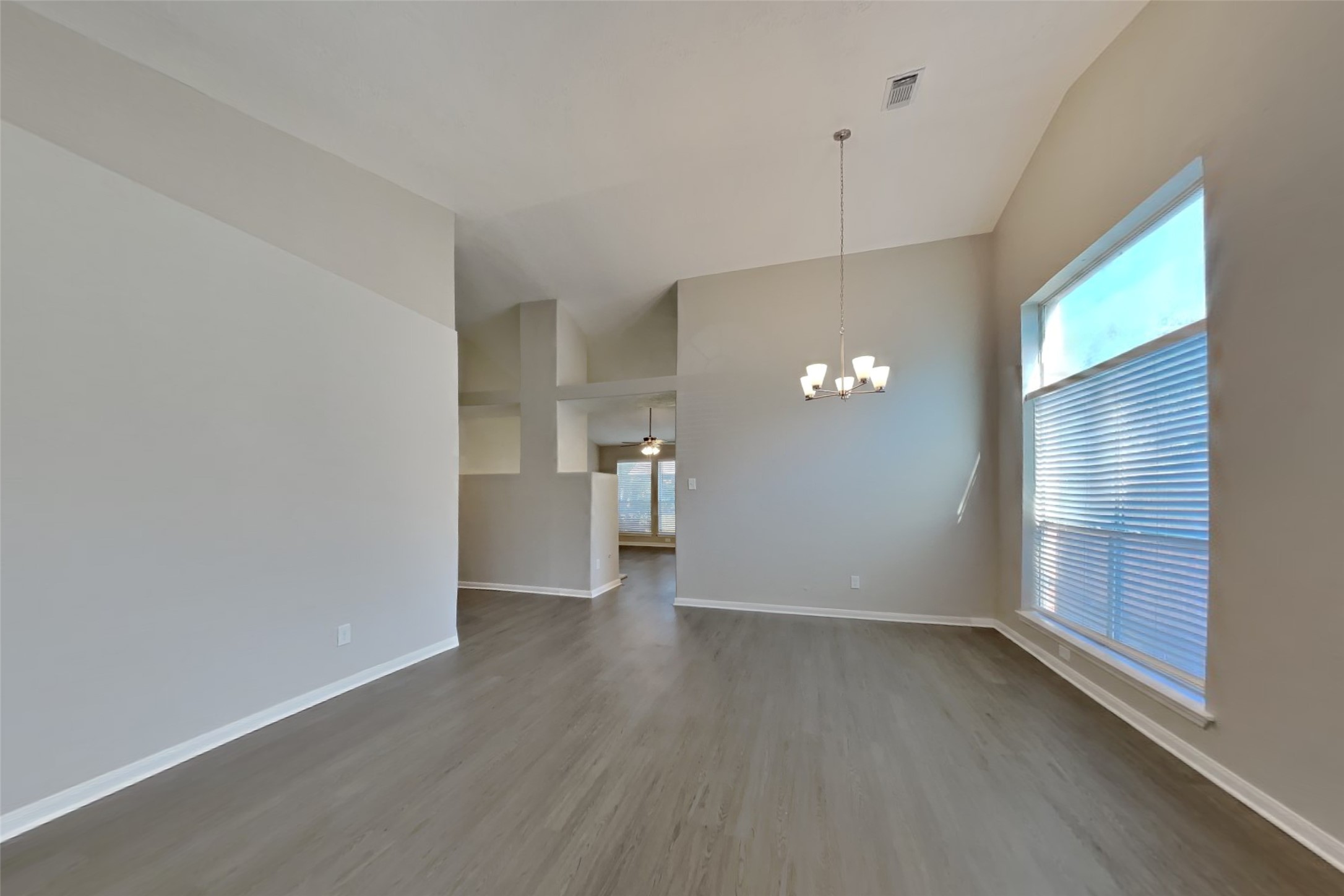 20022 Crossvine Trail Lane Cypress, TX 77433 - Photo 3 of 18 a view of a livingroom with a ceiling fan and window
