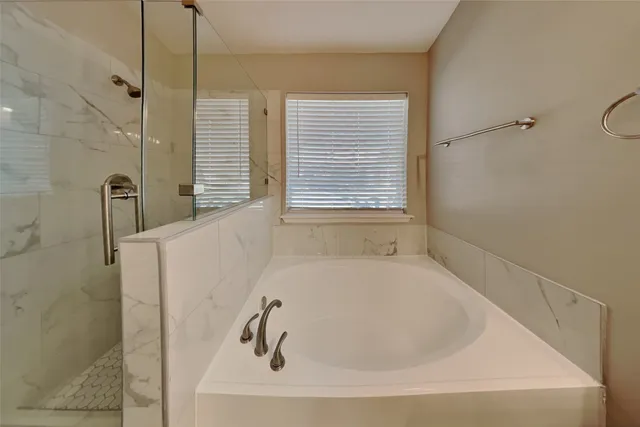 a bathroom with a bathtub