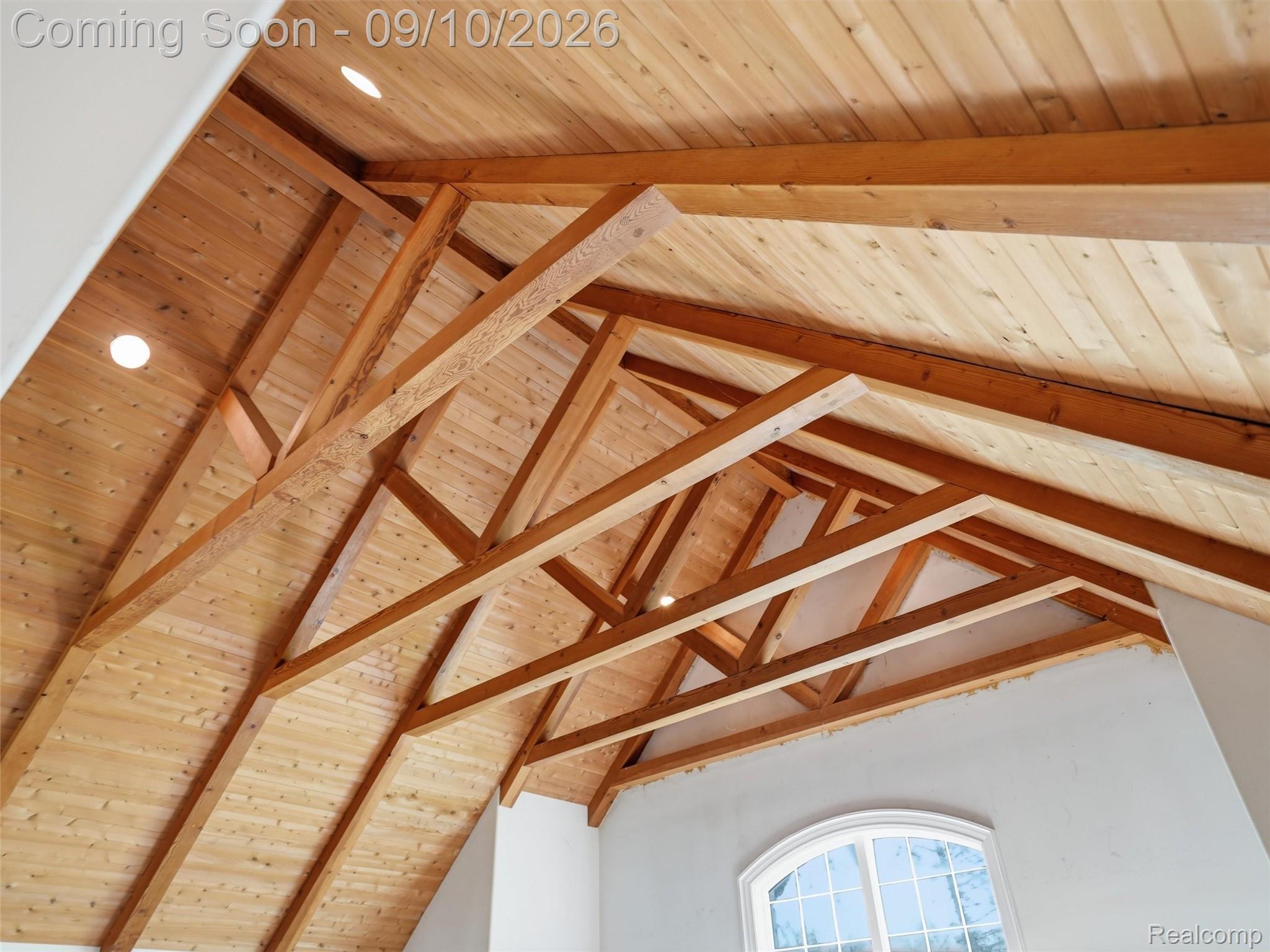 61400 Romeo Plank Road Ray, MI 48096 - Photo 75 of 99 Vaulted wood-paneled ceiling with exposed wood beams, recessed lighting, and an arched window