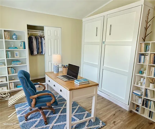 a workspace with furniture and wooden floor
