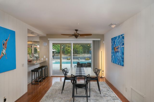 a view of a livingroom with furniture window and outside view