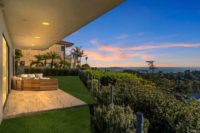 a view of a swimming pool with a lounge chairs