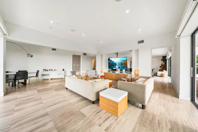 a bathroom with a sink and a large mirror
