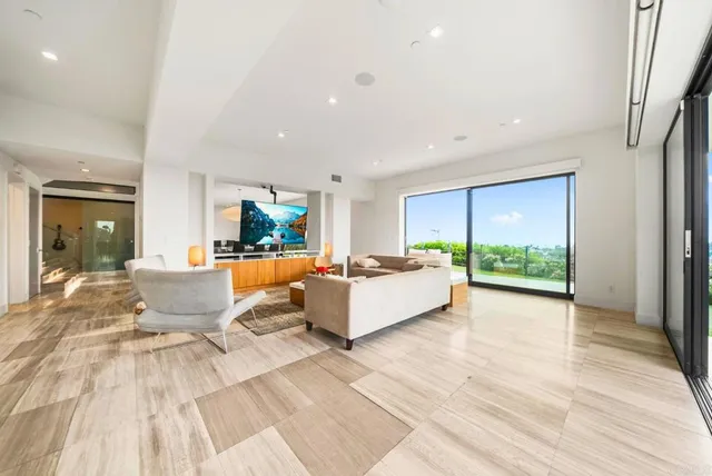 a kitchen with sink stove and cabinets