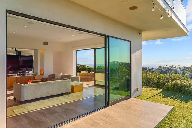 a bathroom with a sink mirror vanity and toilet