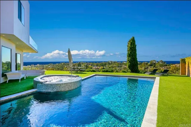 a bed room with a bed and a flat screen tv