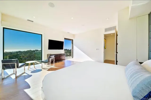 a view of a swimming pool with a chair