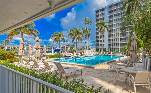 a view of swimming pool from a balcony