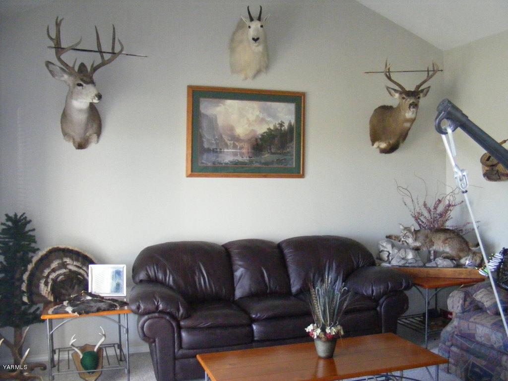 15012 Fisk Road Yakima, WA 98908 - Photo 15 of 23 a view of a livingroom with furniture and windows