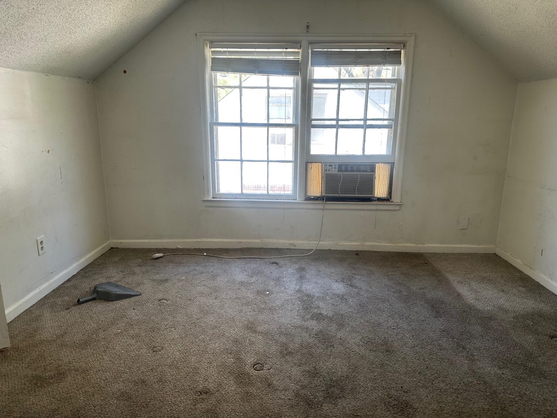 3628 Carrington Road Memphis, TN 38111 - Photo 15 of 15 Bonus room featuring a textured ceiling, carpet floors, healthy amount of natural light, and cooling unit