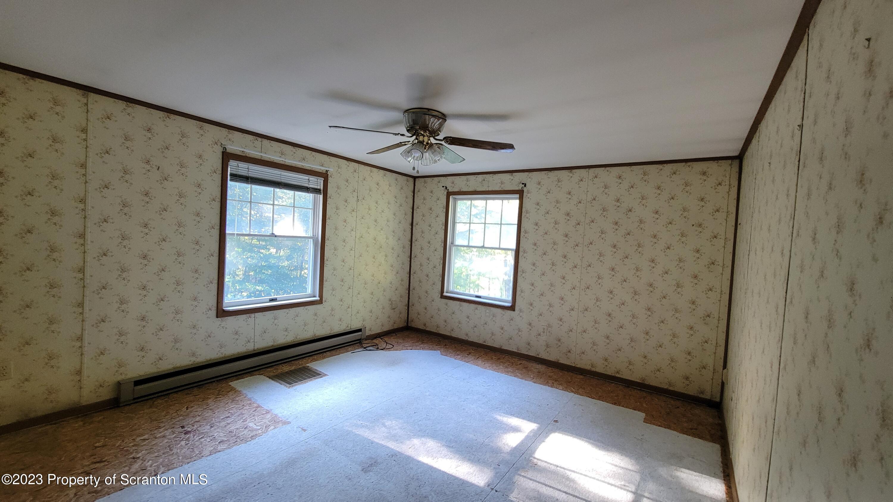 1189 Hunsinger Road Hallstead, PA 18822 - Photo 8 of 11 a view of an empty room with a window