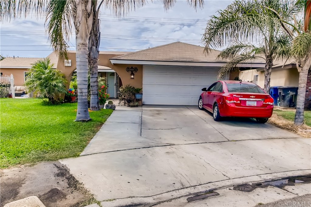 7980 Citadel Court Riverside, CA 92503 - Photo 1 of 1 a front view of a house with garden