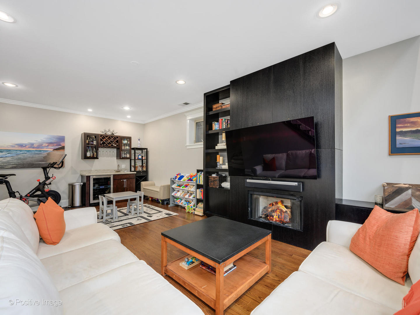 1745 West Roscoe Street, Unit 1 Chicago, IL 60657 - Photo 18 of 29 a living room with furniture and a flat screen tv