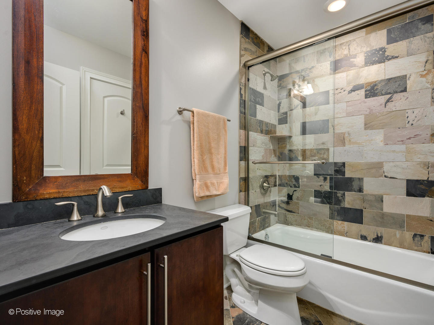 1745 West Roscoe Street, Unit 1 Chicago, IL 60657 - Photo 21 of 29 a bathroom with a sink and a toilet