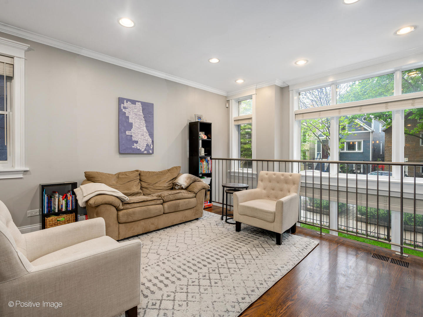 1745 West Roscoe Street, Unit 1 Chicago, IL 60657 - Photo 3 of 29 a living room with furniture or couch and a large window