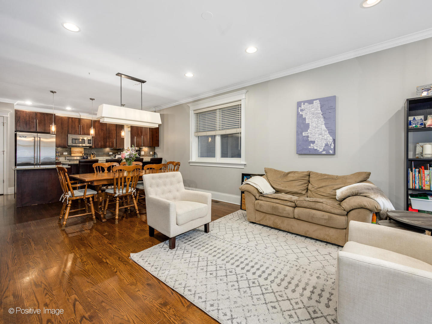 1745 West Roscoe Street, Unit 1 Chicago, IL 60657 - Photo 4 of 29 a living room with furniture and a large window