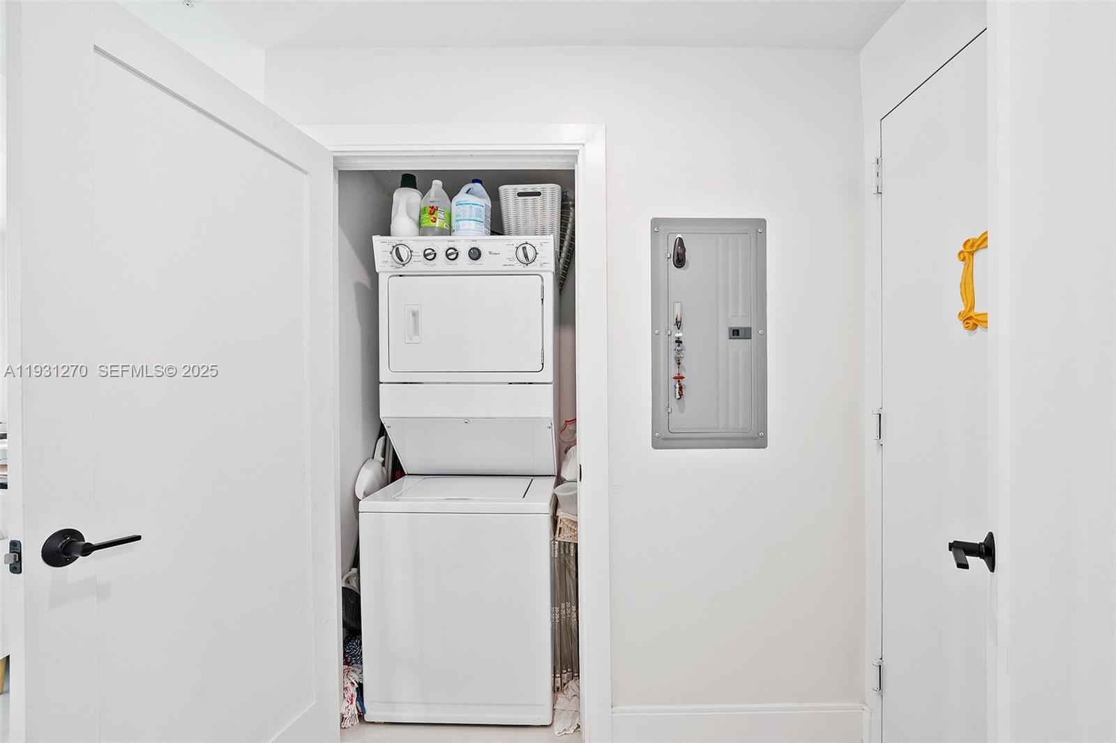 60 Southwest 13th Street, Unit 3603 Miami, FL 33130 - Photo 22 of 27 a utility room with dryer and washer