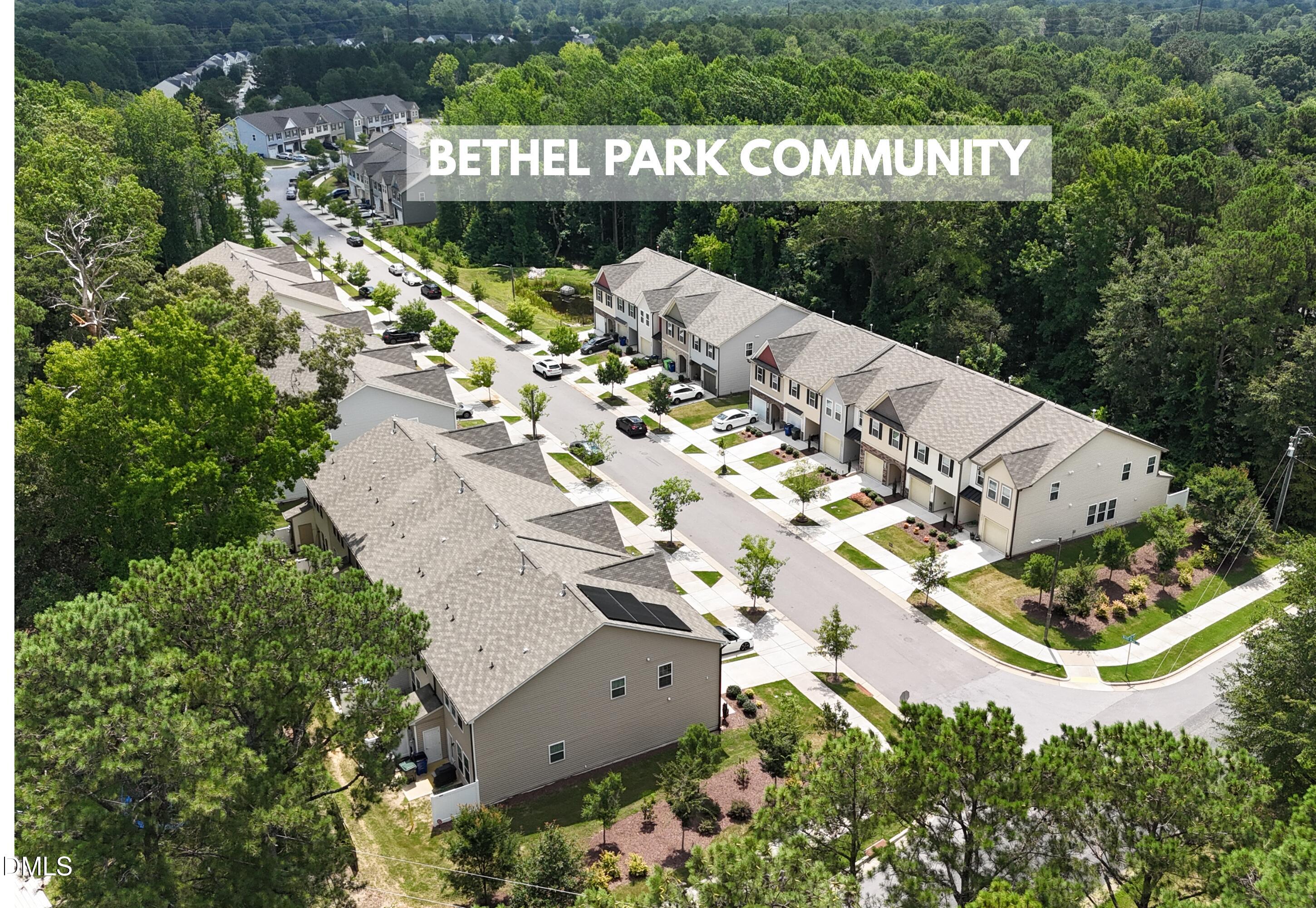 1400 Bethel Road Raleigh, NC 27610 - Photo 2 of 6 an aerial view of a house with a yard and green space