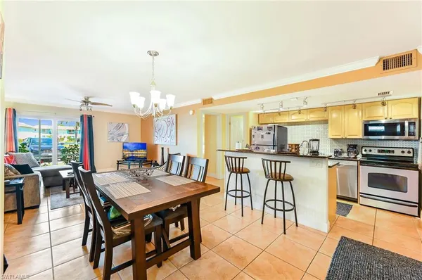 a view of a dining room with furniture