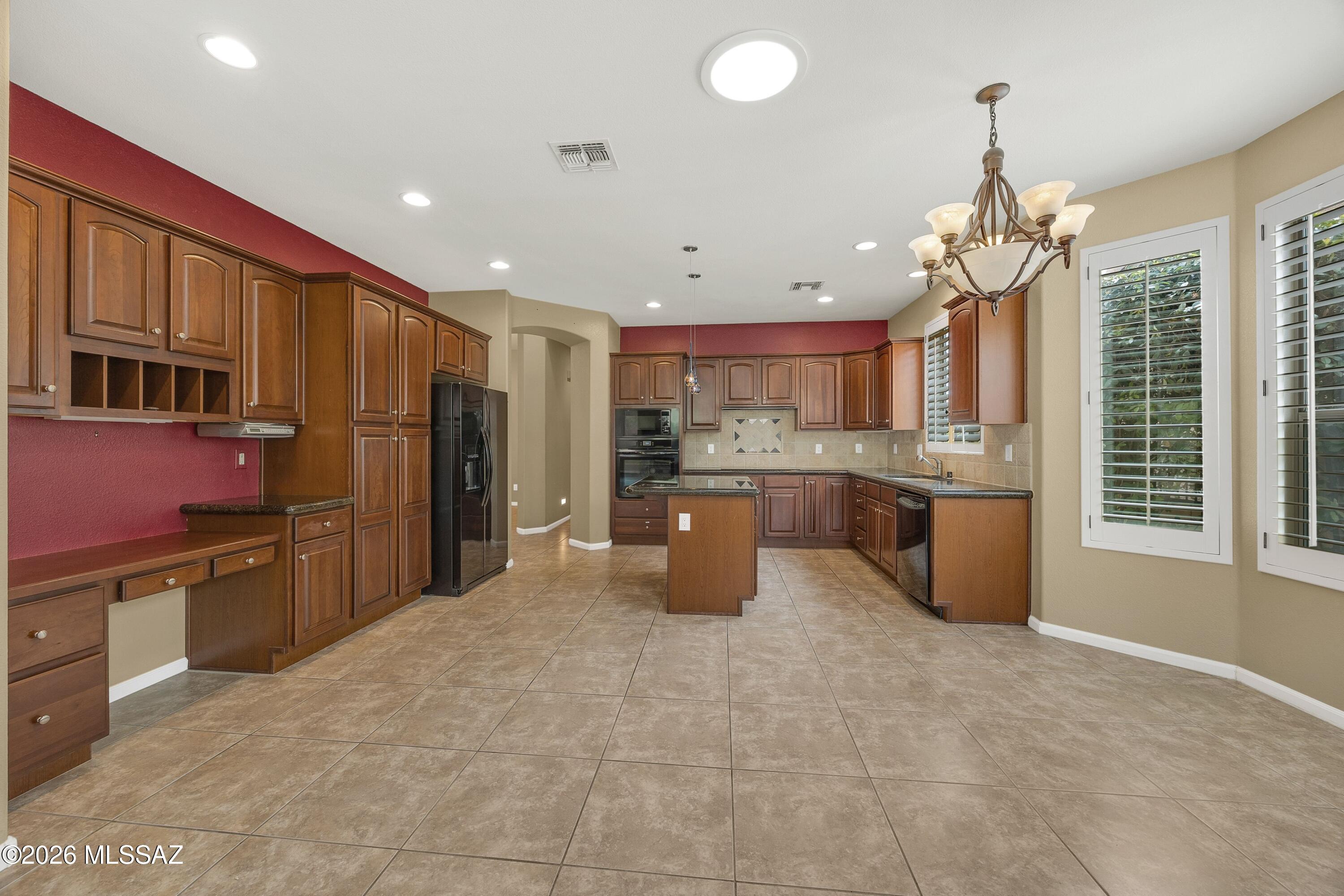 62090 East Northwood Road Tucson, AZ 85739 - Photo 14 of 49 Cherry Cabinets & handy Desk