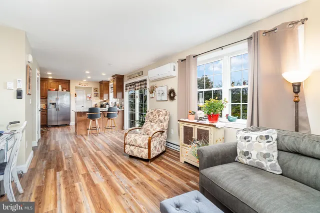 a living room with furniture and a table