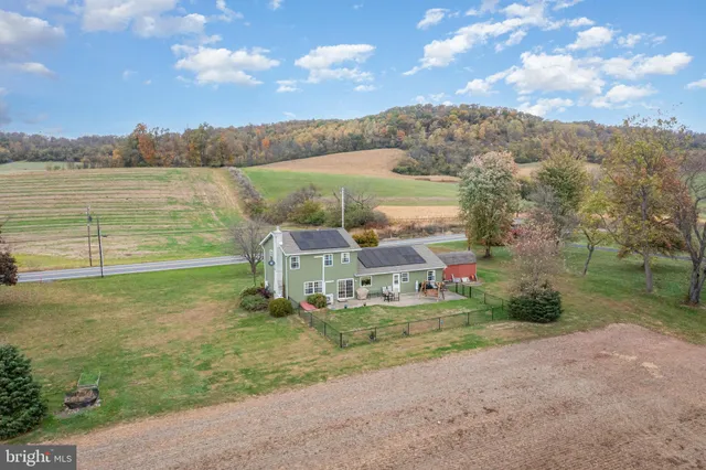 a view of a lake with a yard