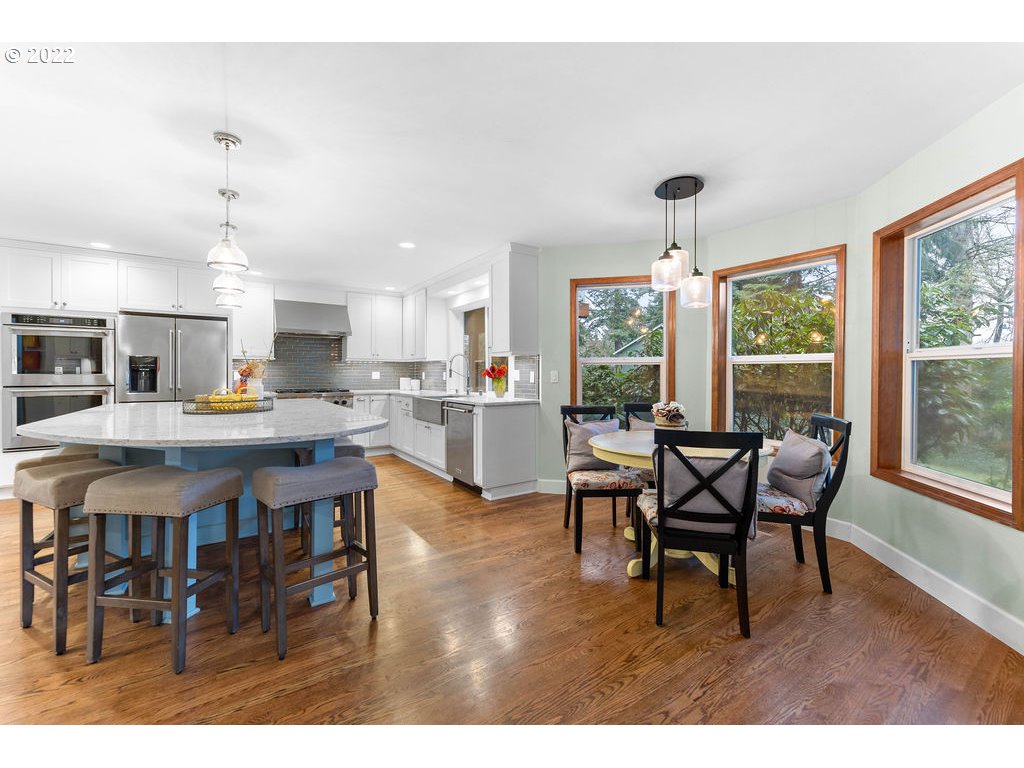 20010 Southeast 3rd Circle Camas, WA 98607 - Photo 13 of 28 a open dining room with stainless steel appliances kitchen island granite countertop furniture and a kitchen view