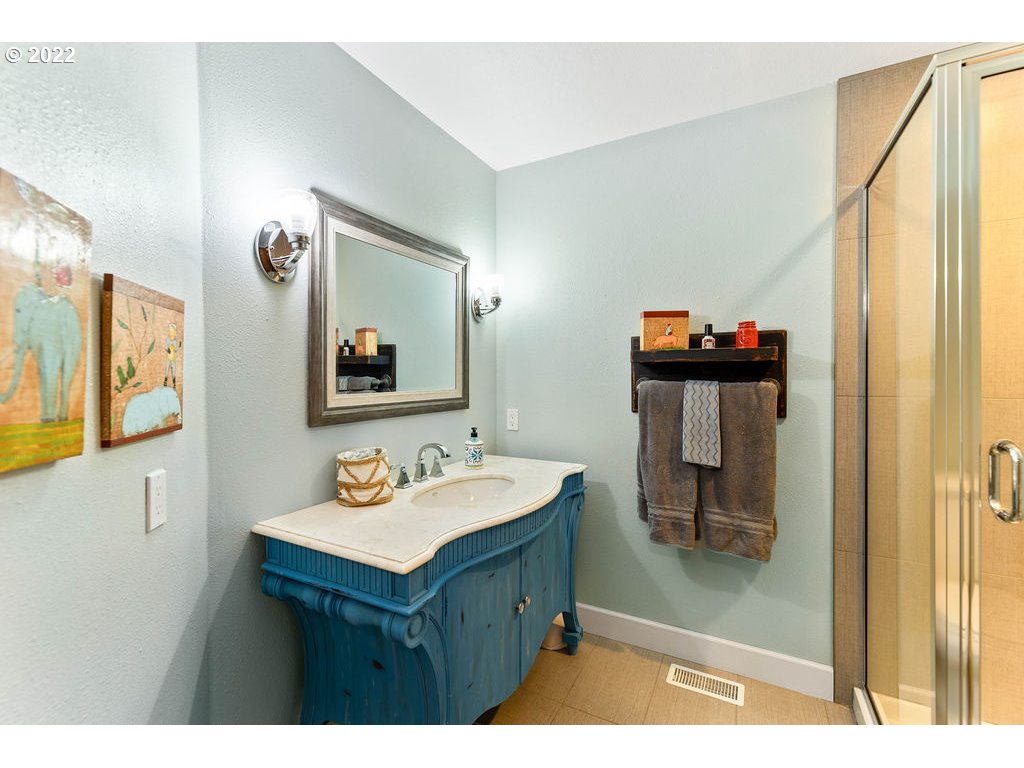 20010 Southeast 3rd Circle Camas, WA 98607 - Photo 19 of 28 a bathroom with a sink and a mirror