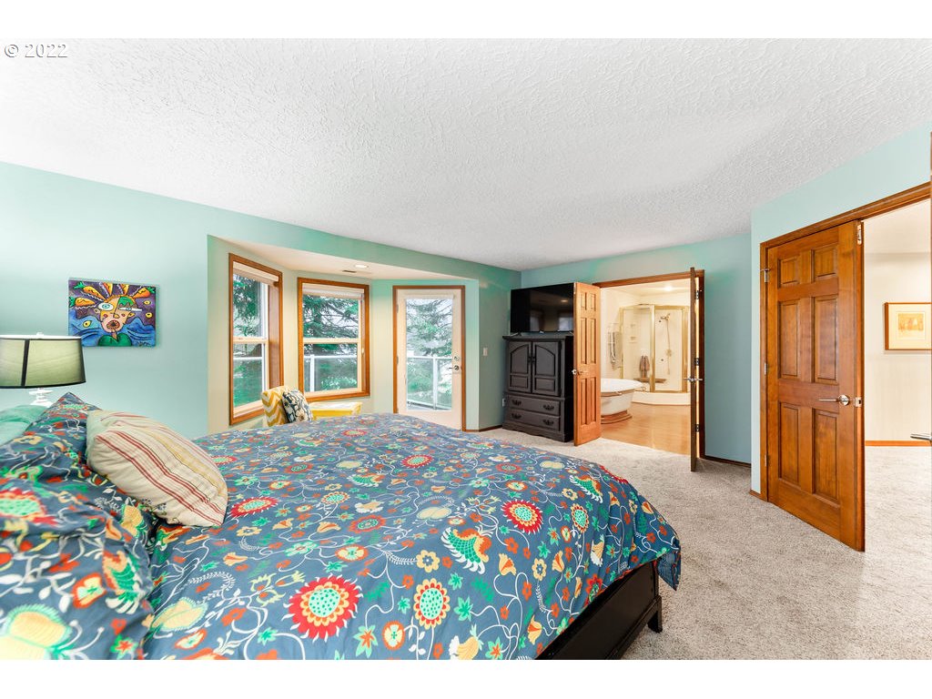 20010 Southeast 3rd Circle Camas, WA 98607 - Photo 22 of 28 a bedroom with a bed and a window