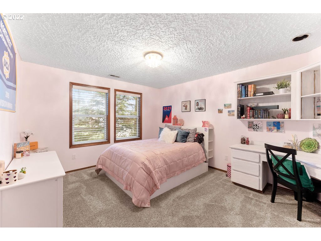 20010 Southeast 3rd Circle Camas, WA 98607 - Photo 25 of 28 a bed room with a bed and a chair