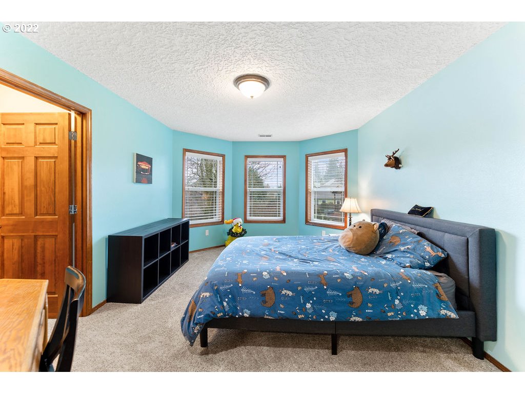 20010 Southeast 3rd Circle Camas, WA 98607 - Photo 26 of 28 a bedroom with furniture and window