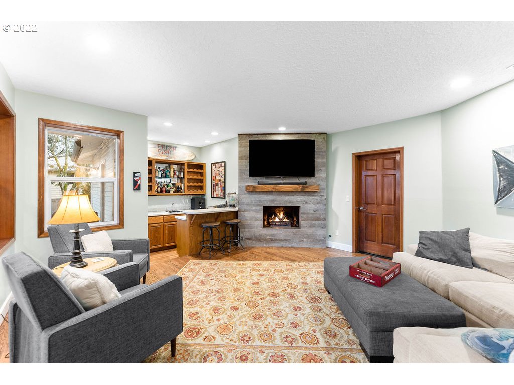20010 Southeast 3rd Circle Camas, WA 98607 - Photo 8 of 28 a living room with furniture and a flat screen tv