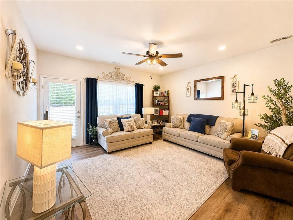 53 Bennett Way Rome, GA 30161 - Photo 13 of 42 a living room with furniture and a fireplace