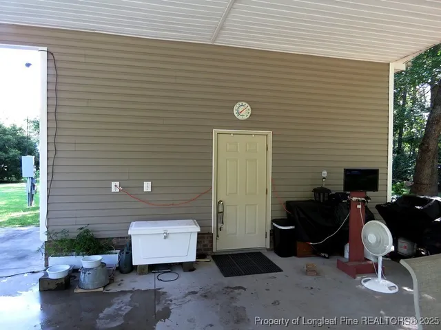 a view of balcony with wooden floor and lake view