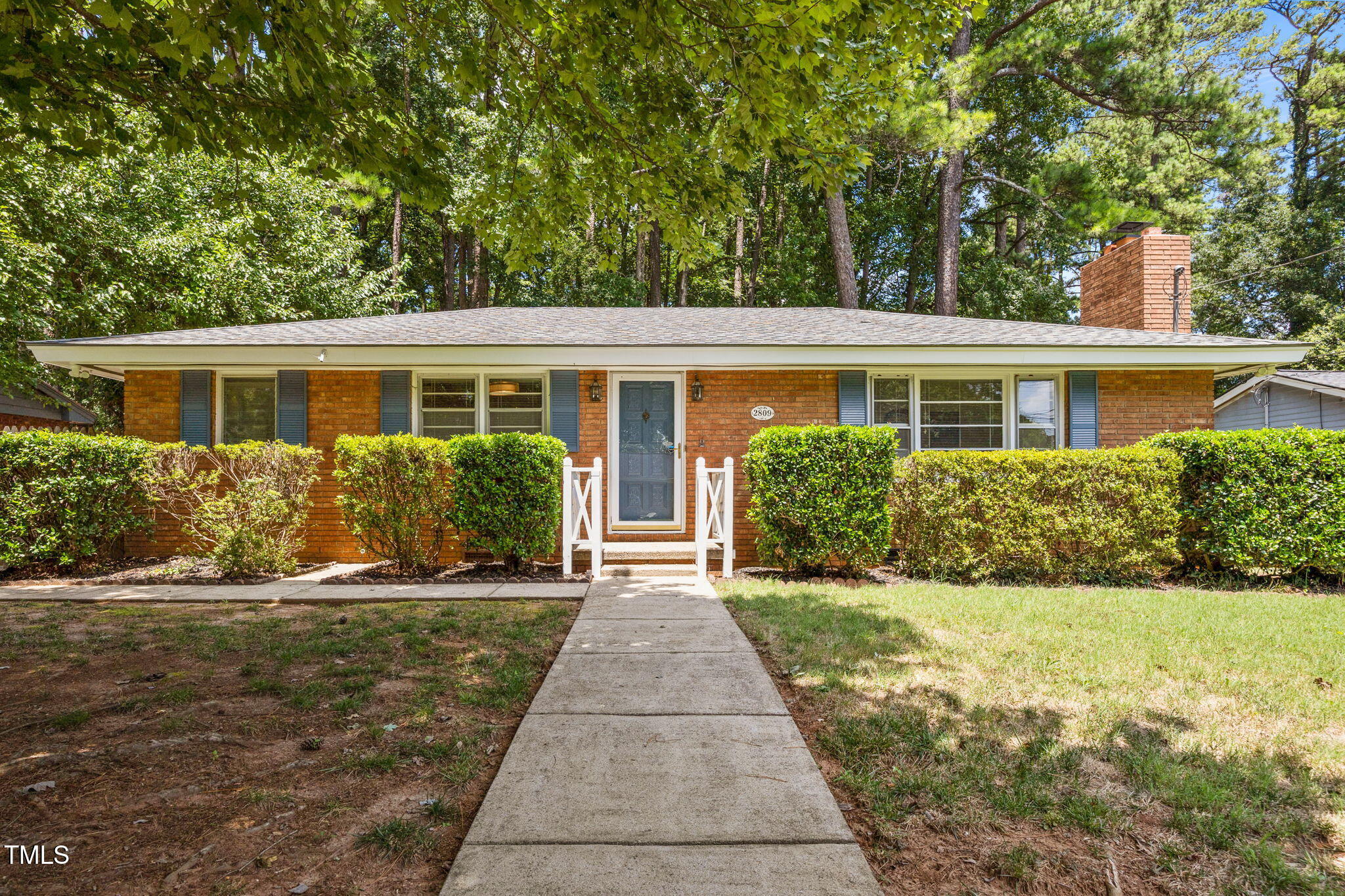 2809 Bardwell Road Raleigh, NC 27604 - Photo 1 of 19 front view of a house with a yard