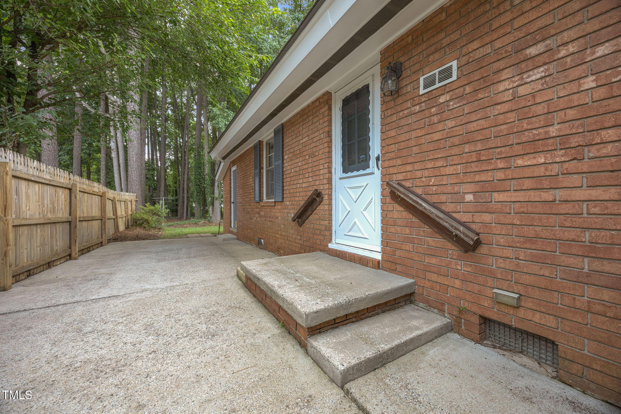 2809 Bardwell Road Raleigh, NC 27604 - Photo 15 of 19 a view of a house with a yard and large tree